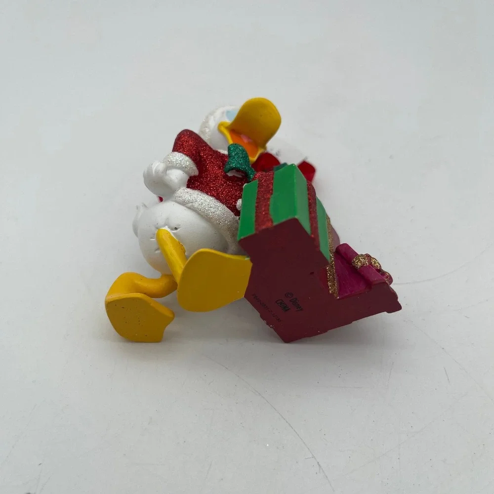 Disney Donald Duck Santa Christmas Ornament with Presents Glitter Accents NEW